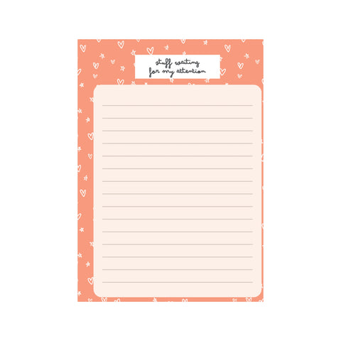 Orange and beige notepad with hearts and stars pattern, titled 'stuff waiting for my attention' for eco-friendly stationery
