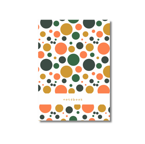 Colorful polka dot notebook with orange, green, and yellow hues
