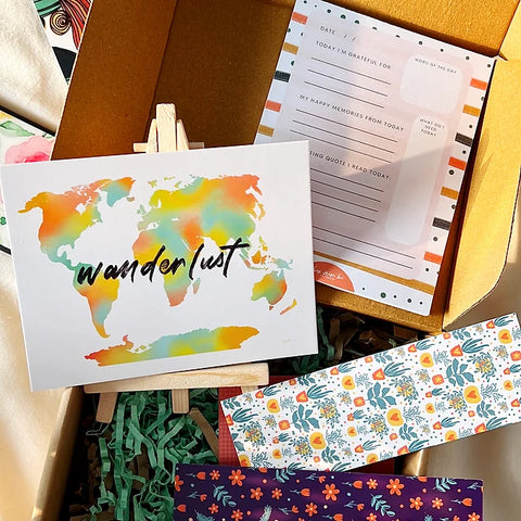 Vibrant desk bundle for journaling and decor with artistic map and motivational layout