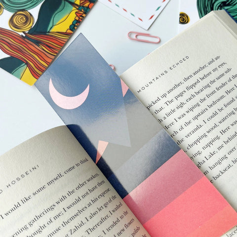 Modern aesthetic bookmark featuring pink moonrise illustration