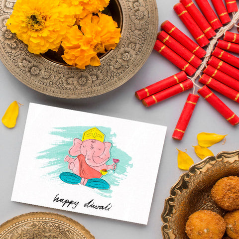 Colorful Diwali greeting card featuring Lord Ganesha illustration and festive elements.