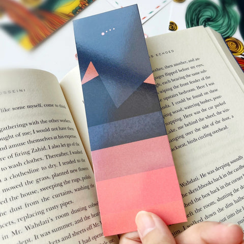 Dual-sided bookmark with night sky and mountain design