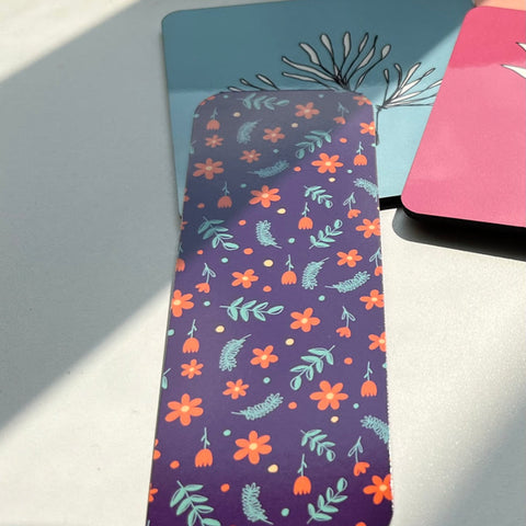 Cute botanical-themed bookmark with orange flowers on purple background