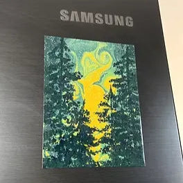 Hand-painted forest scene on decorative fridge magnet