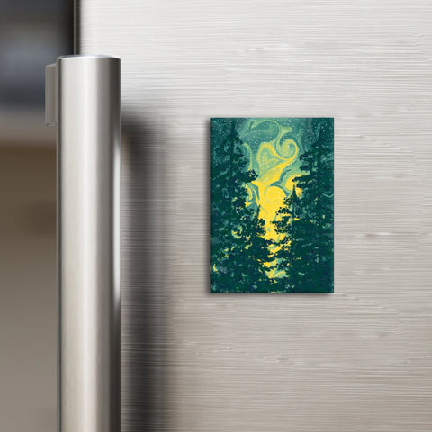 Colorful abstract magnet on a metallic refrigerator door

