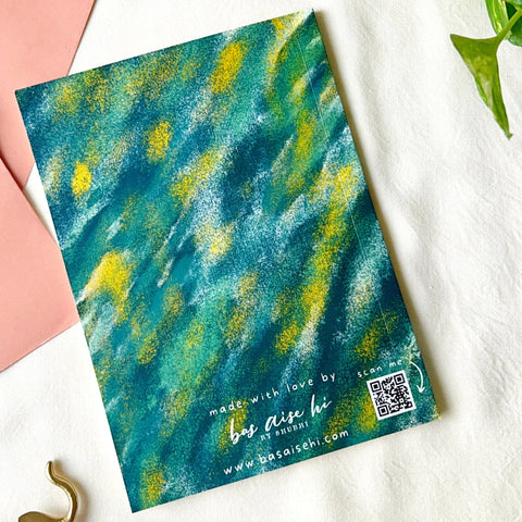 Colorful notebook cover with blue, green, and yellow abstract design on white fabric, eco-friendly stationery