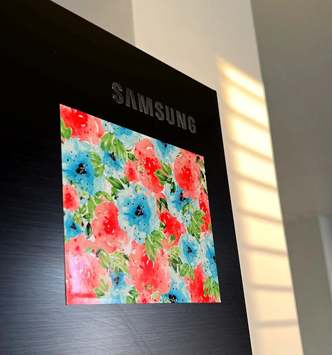 Decorative fridge magnet featuring vibrant roses and poppies artwork.

