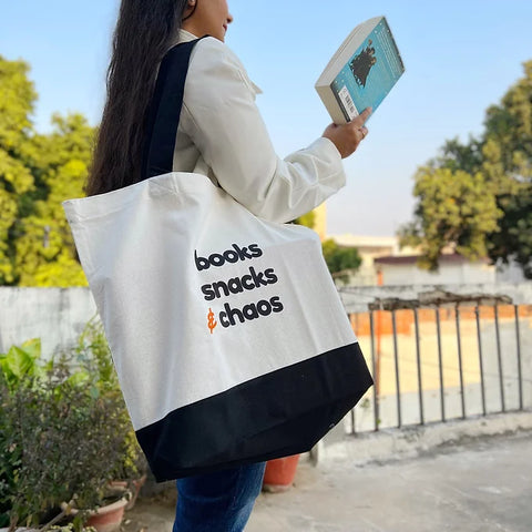 Funny quote deluxe tote bag in black and white for readers and students.