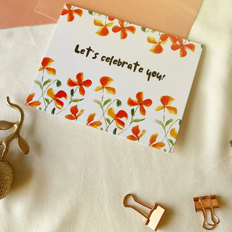 Aesthetic flatly of a celebration greeting card with watercolor floral border