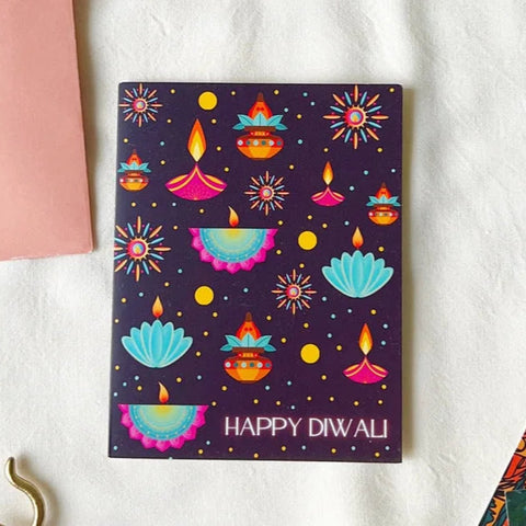 Vibrant Diwali greeting card with colorful diyas and festive design