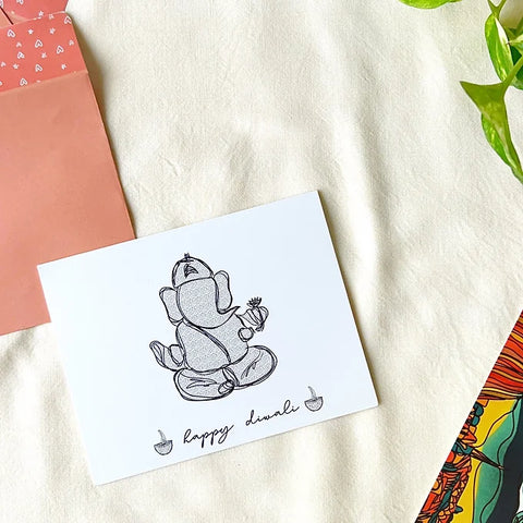 Diwali greeting card featuring Lord Ganesh in a black-themed artistic design with note Happy Diwali
