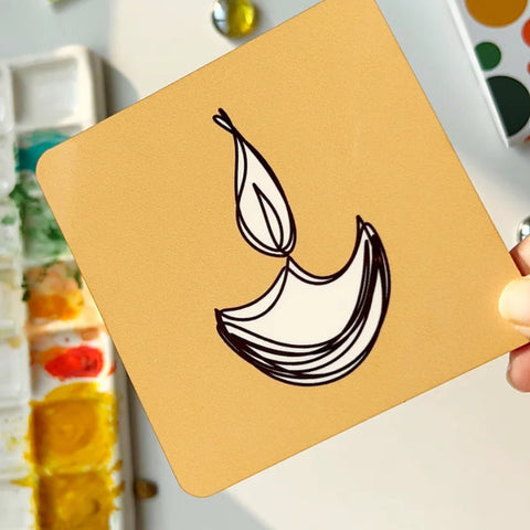 "Colorful handmade coasters featuring modern Diwali lamp artwork"
