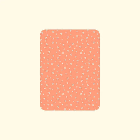 "Designer playing cards featuring orange background and white heart motifs"