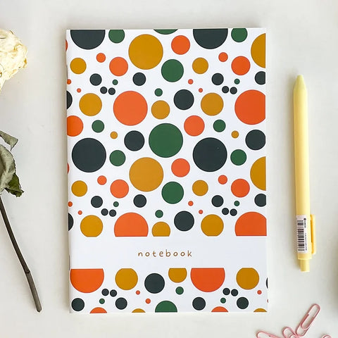Minimalist softcover notebook featuring geometric dot pattern