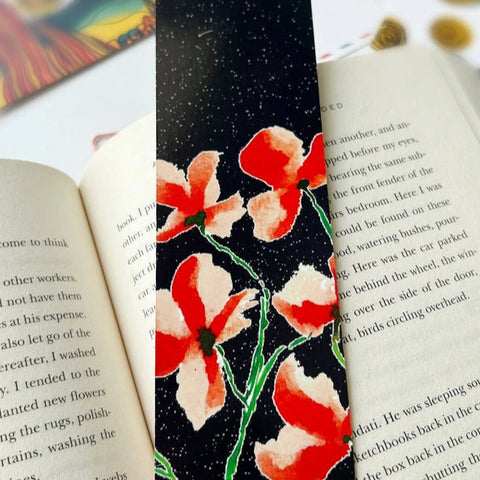 "Dual-sided bookmark with moonlit sky and red flower artwork"