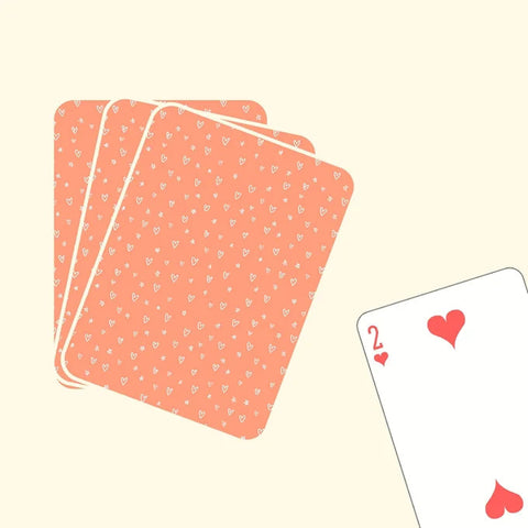 "Custom orange playing cards with cute heart pattern back design"