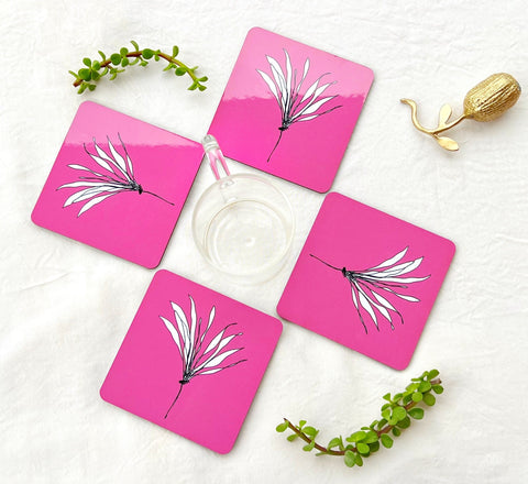 Aesthetic flower-themed coasters in pink, blue, and peach tones