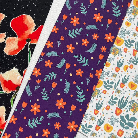 Purple bookmark with vibrant orange and teal floral pattern