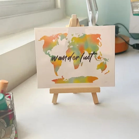 Minimalist travel art card featuring wanderlust message for decor.