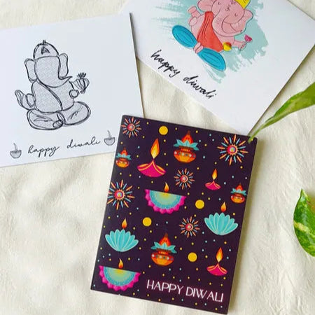 Indian festival card for Diwali with candles, diyas, and lotus motifs