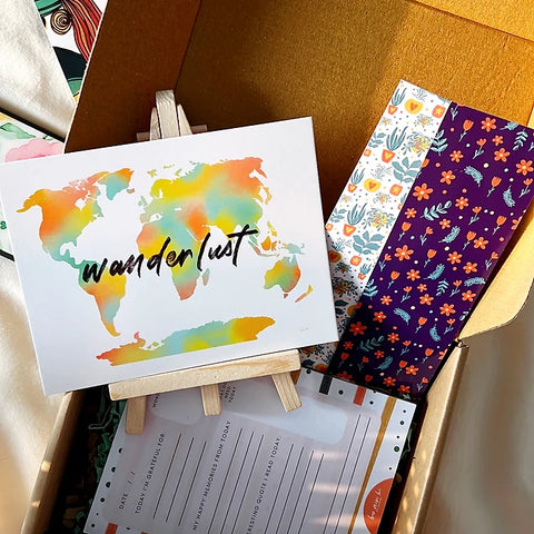 Wanderlust-themed art card with gratitude journaling prompt and aesthetic papers