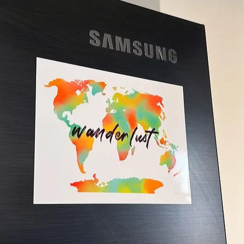Wanderlust-themed fridge magnet painting for travel lovers
