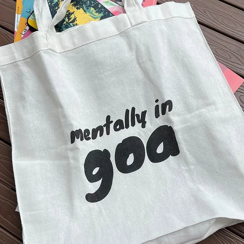 "Eco-friendly white cotton bag with vacation-themed quote"